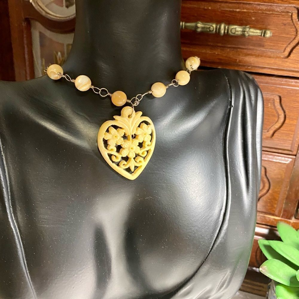 CARVED resin heart necklace